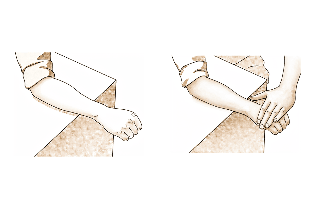 Forearm resting on a table, palm down, gently lifting the back of the hand against the resistance of the other hand.